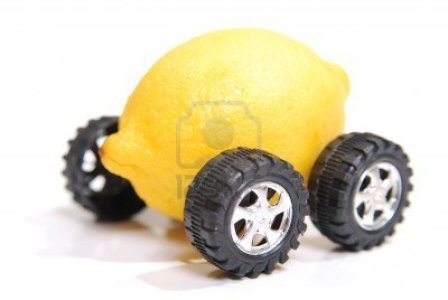 5224473-a-lemon-with-wheels-representing-a-defective-vehicle-shallow-depth-of-field-focus-on-fro.jpg